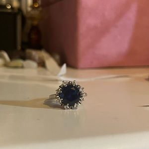 Vintage 10k ring with a big blue sapphire with tiny diamonds